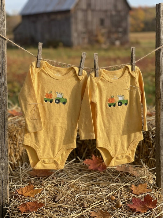 Tractor Pulling A Pumpkin Onesie